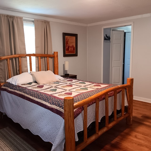 bedroom featuring hardwood / wood-style floors