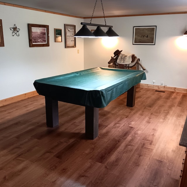 game room with hardwood / wood-style flooring, ornamental molding, and billiards