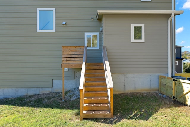 back of house featuring a yard