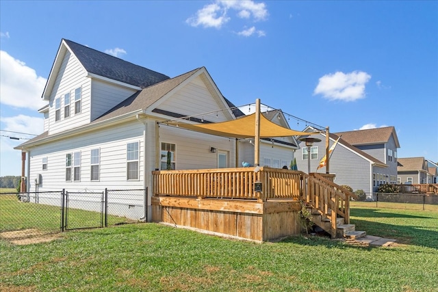 back of property featuring a yard and a deck