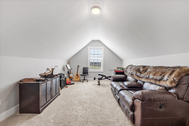 interior space with lofted ceiling and light carpet