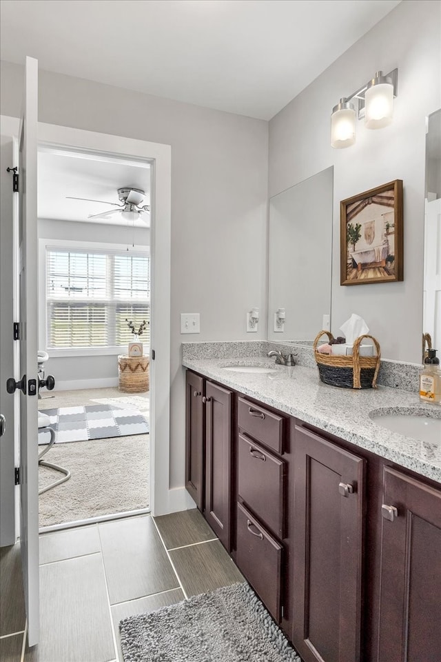 bathroom with vanity and ceiling fan