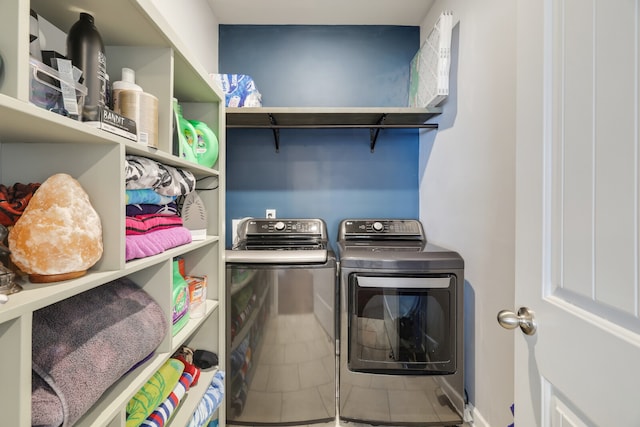 laundry area with separate washer and dryer