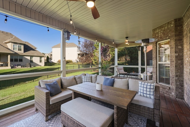 view of patio / terrace with ceiling fan and outdoor lounge area