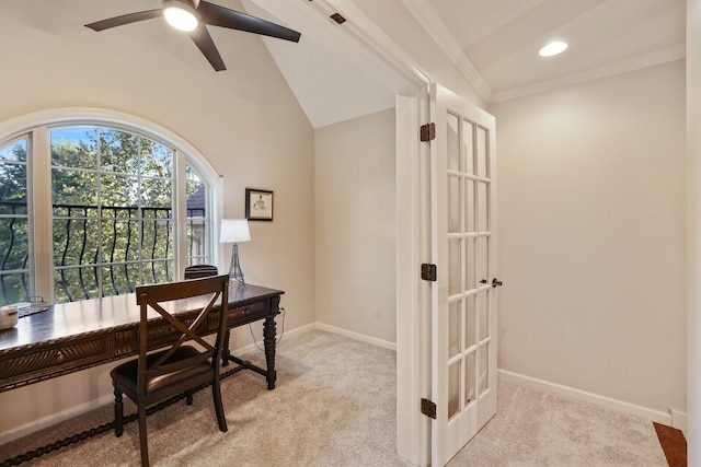 home office featuring light carpet, crown molding, lofted ceiling, and ceiling fan