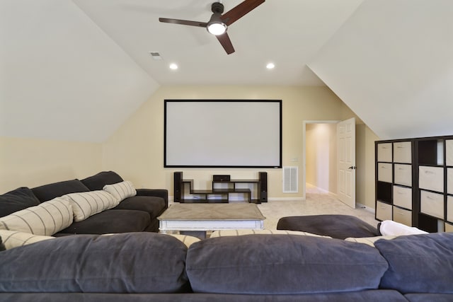 carpeted cinema featuring ceiling fan and lofted ceiling