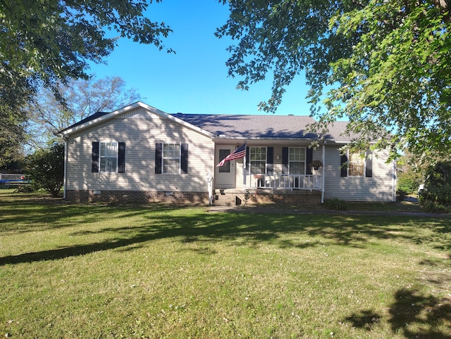 single story home with covered porch and a front lawn