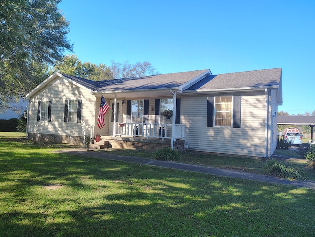 ranch-style home featuring a porch and a front lawn