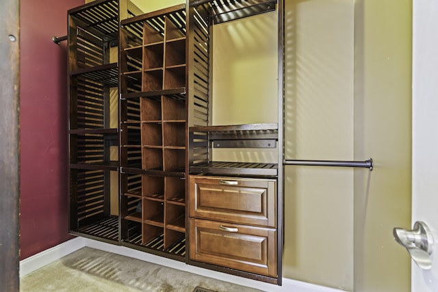 wine cellar with light colored carpet