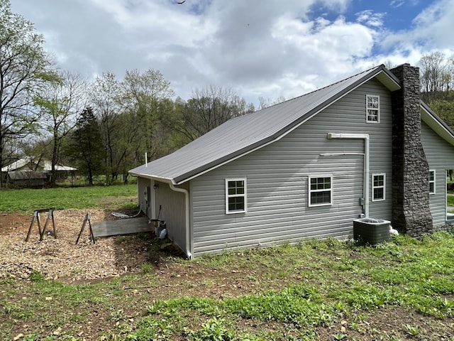 view of home's exterior featuring cooling unit