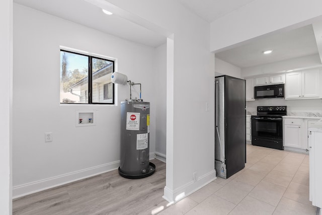 utility room featuring water heater