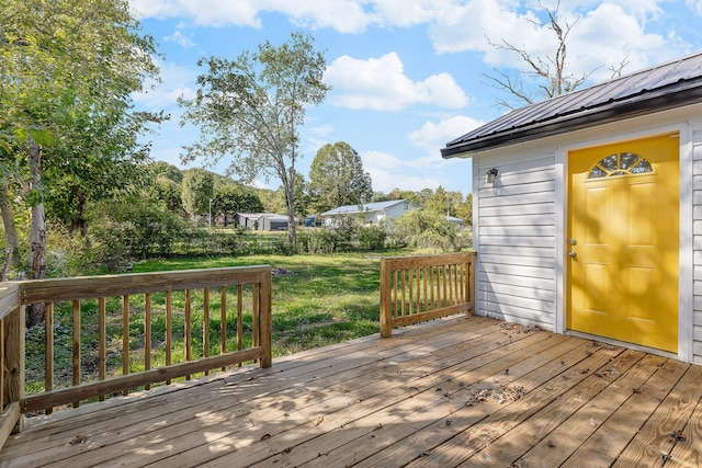 deck featuring a lawn