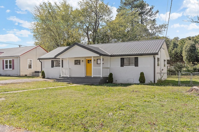 ranch-style house with a front lawn