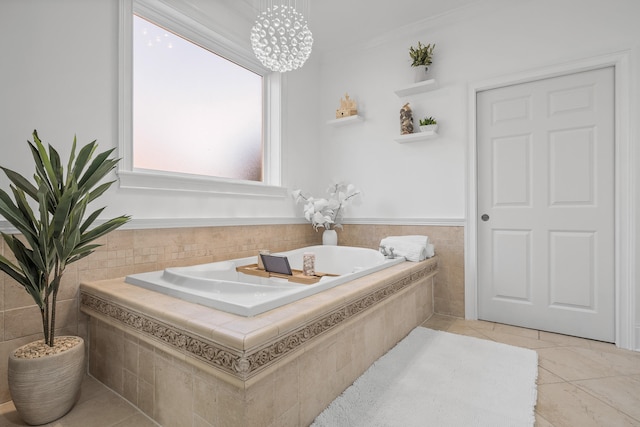 bathroom featuring crown molding, tiled bath, and tile patterned flooring