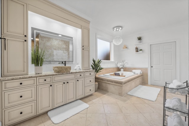 bathroom featuring vanity, ornamental molding, and tiled tub