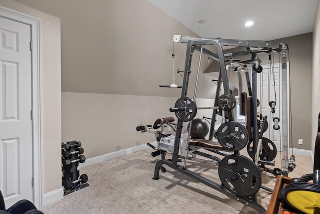 workout area featuring light carpet