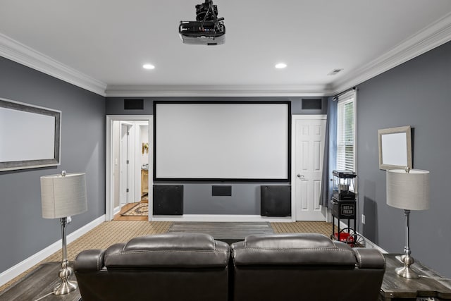 cinema featuring crown molding and wood-type flooring