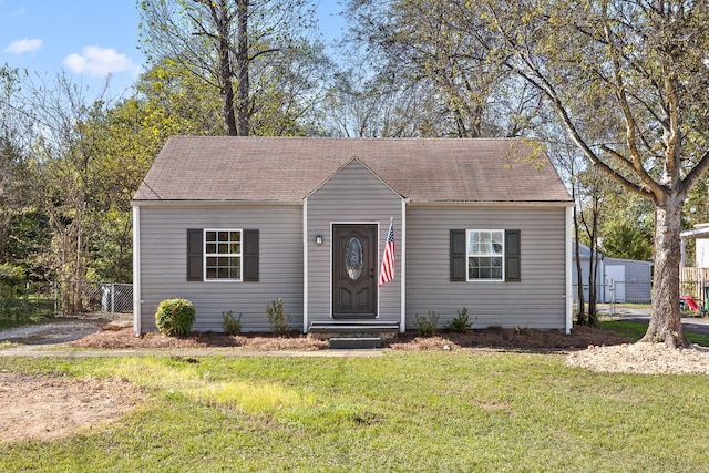 view of front of house with a front lawn