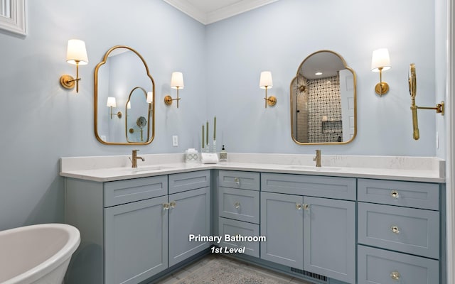 bathroom with vanity, ornamental molding, and independent shower and bath