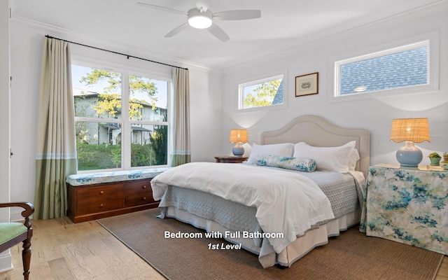 bedroom featuring ceiling fan, light wood-type flooring, and crown molding