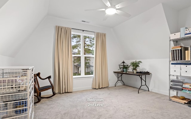 sitting room with light colored carpet, ceiling fan, and lofted ceiling