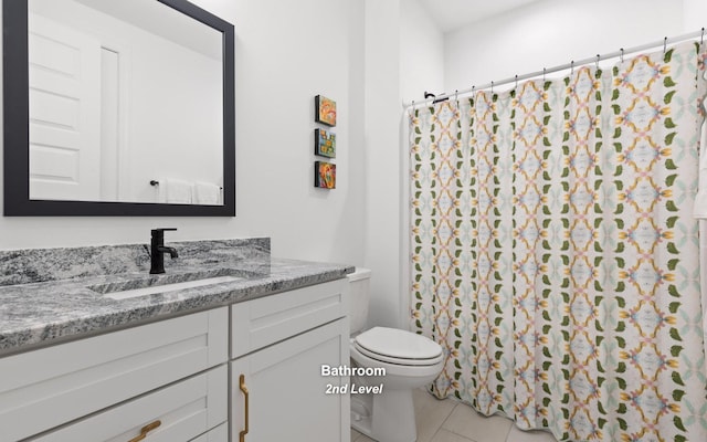 1871 Notting Hl, Chattanooga, TN 37405 - bathroom featuring a shower with curtain, tile patterned floors, vanity, and toilet