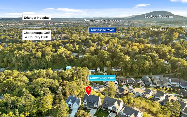 birds eye view of property with a mountain view