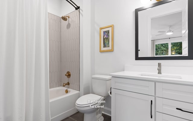 full bathroom with vanity, toilet, ceiling fan, and shower / bath combo with shower curtain