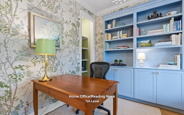 office space featuring built in features, crown molding, and light hardwood / wood-style flooring