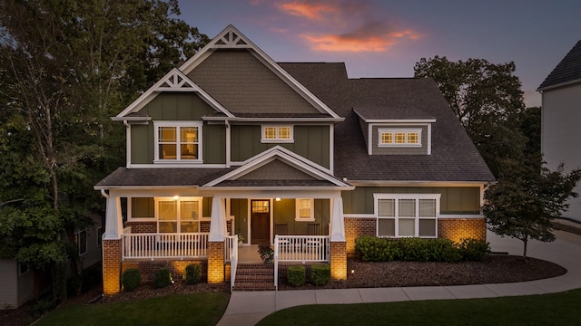 craftsman-style home with covered porch