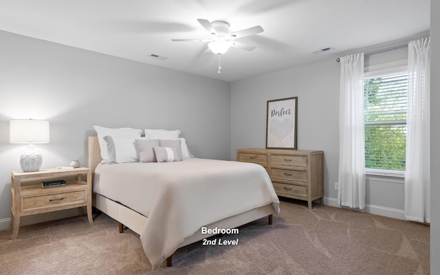 carpeted bedroom featuring ceiling fan