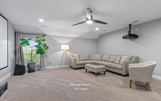 living room with light carpet and ceiling fan