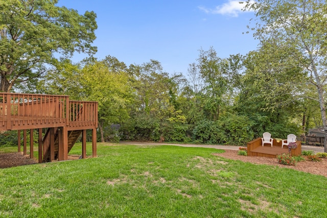 view of yard with a deck