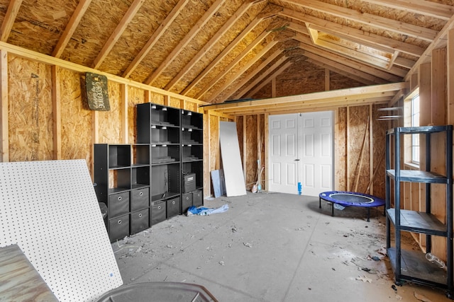 miscellaneous room featuring vaulted ceiling