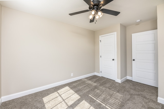 unfurnished bedroom featuring carpet, a closet, and ceiling fan