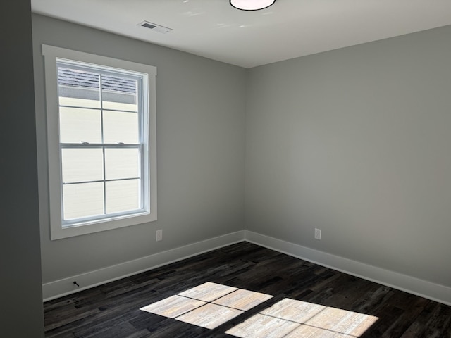952 Greenwood Ave, Clarksville, TN 37040 - unfurnished room featuring baseboards, dark wood finished floors, and visible vents