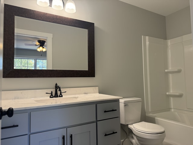 full bathroom featuring vanity, shower / tub combination, and toilet