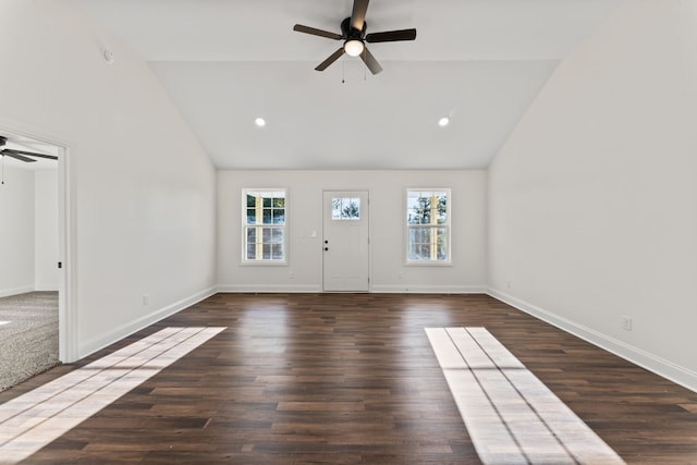 interior space featuring ceiling fan, high vaulted ceiling, and dark hardwood / wood-style floors