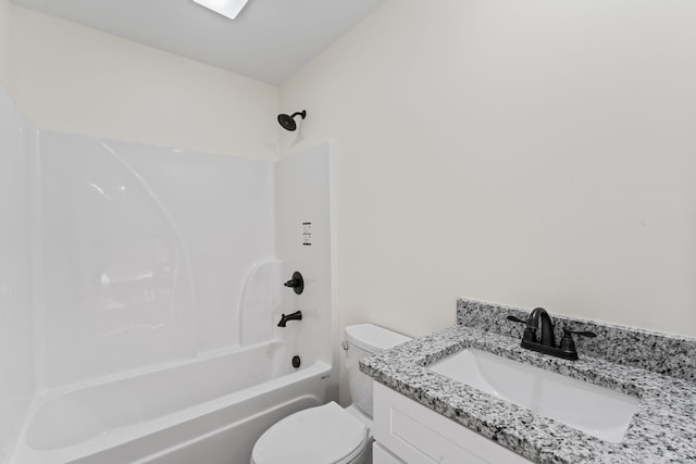 full bathroom featuring toilet, shower / washtub combination, and vanity