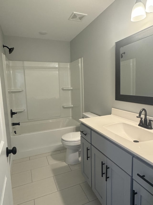 954 Greenwood Ave, Clarksville, TN 37040 - full bathroom featuring visible vents, tile patterned flooring, vanity, toilet, and tub / shower combination