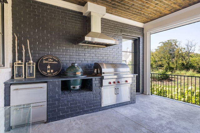 view of patio with a balcony, exterior kitchen, and grilling area