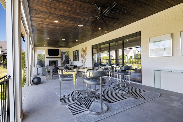 view of patio featuring ceiling fan