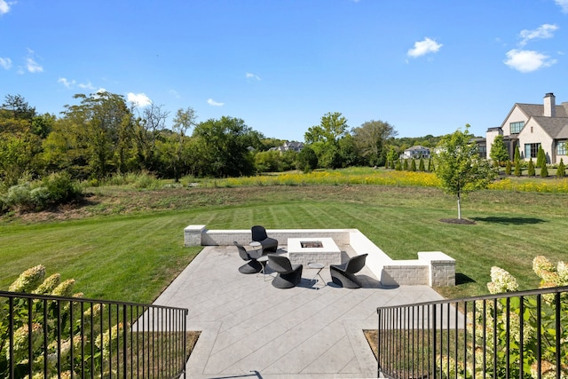 view of patio featuring a fire pit