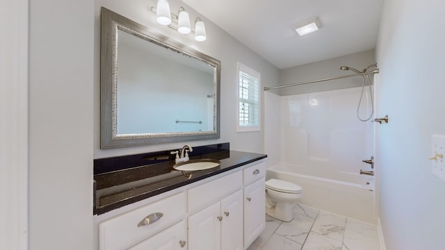 full bathroom featuring toilet, vanity, and washtub / shower combination