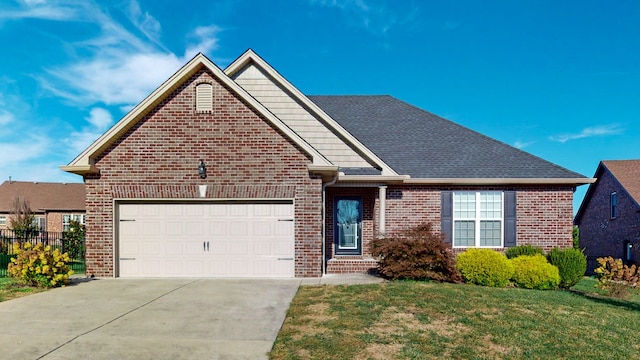 front facade featuring a front lawn and a garage