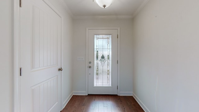 doorway to outside with dark wood-type flooring and ornamental molding