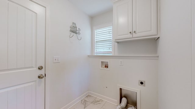 laundry room with hookup for a washing machine, electric dryer hookup, and cabinets