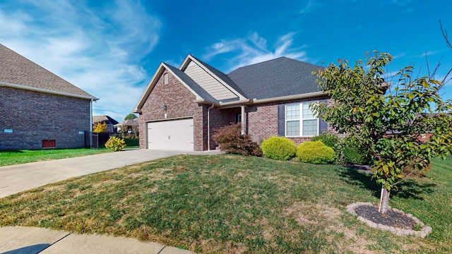 view of front of property with a garage and a front lawn