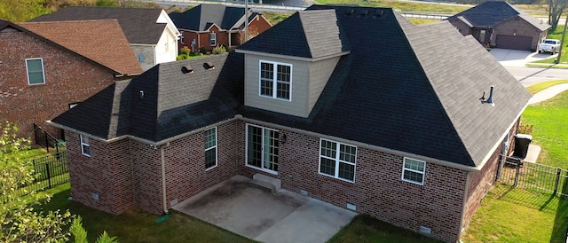 back of house with a garage