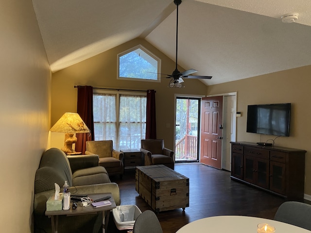 living room featuring ceiling fan, high vaulted ceiling, and dark hardwood / wood-style flooring